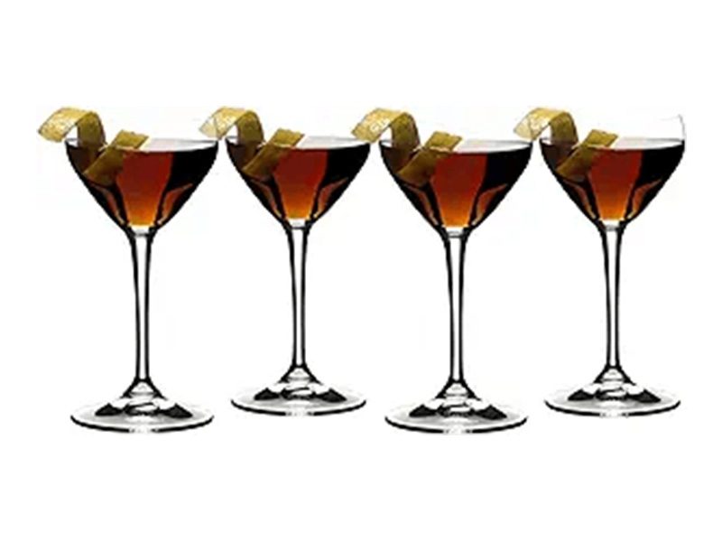 Four cocktails with lemon twists