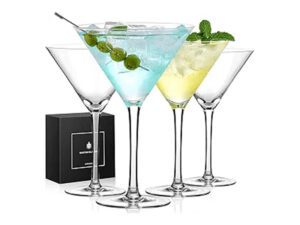 Elegant martini glasses with garnishes