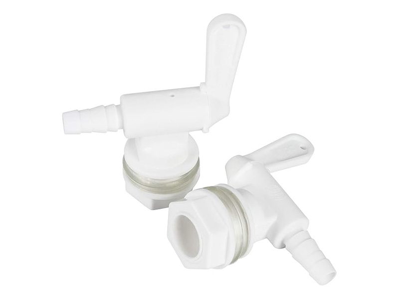 Plastic spigot taps on white background