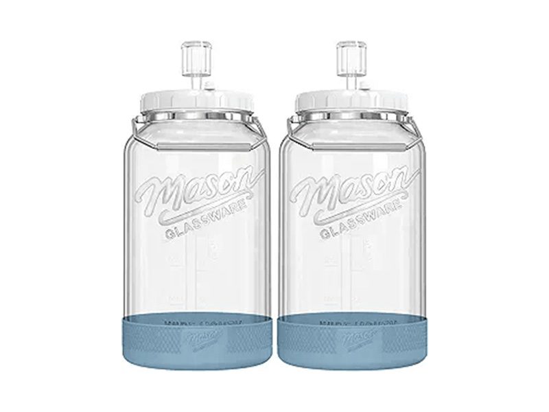 Twin glass jars with spigots